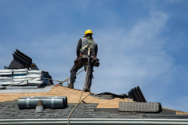 Professional Flat Roof Repair technician working in Iola, TX